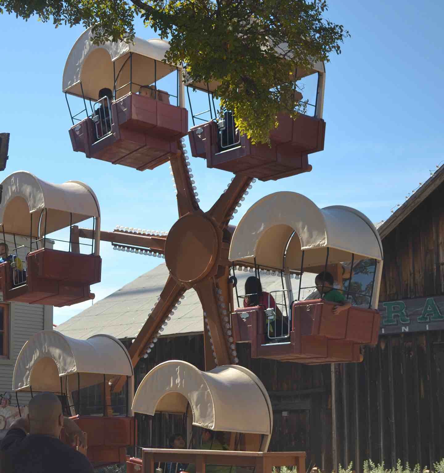 Guests on a wagon ferris wheel.