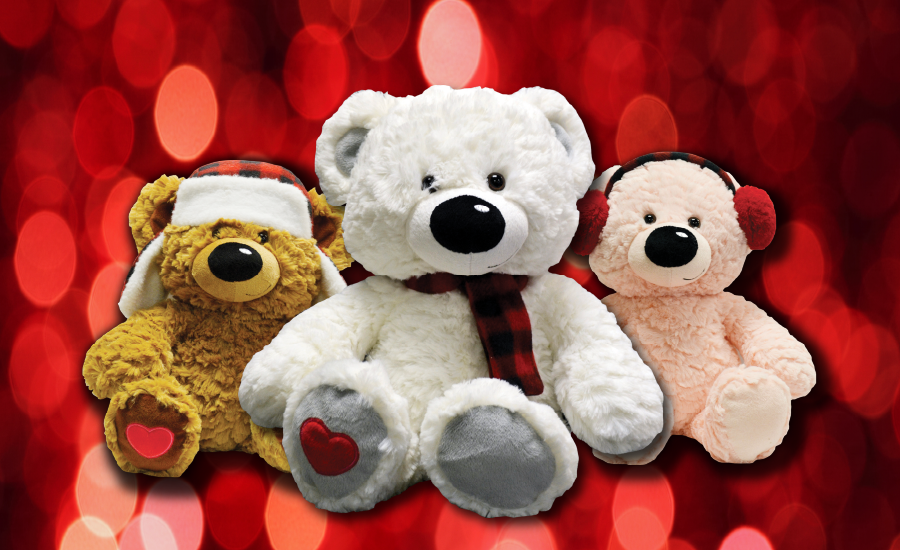 Three teddy bears wearing winter clothing.