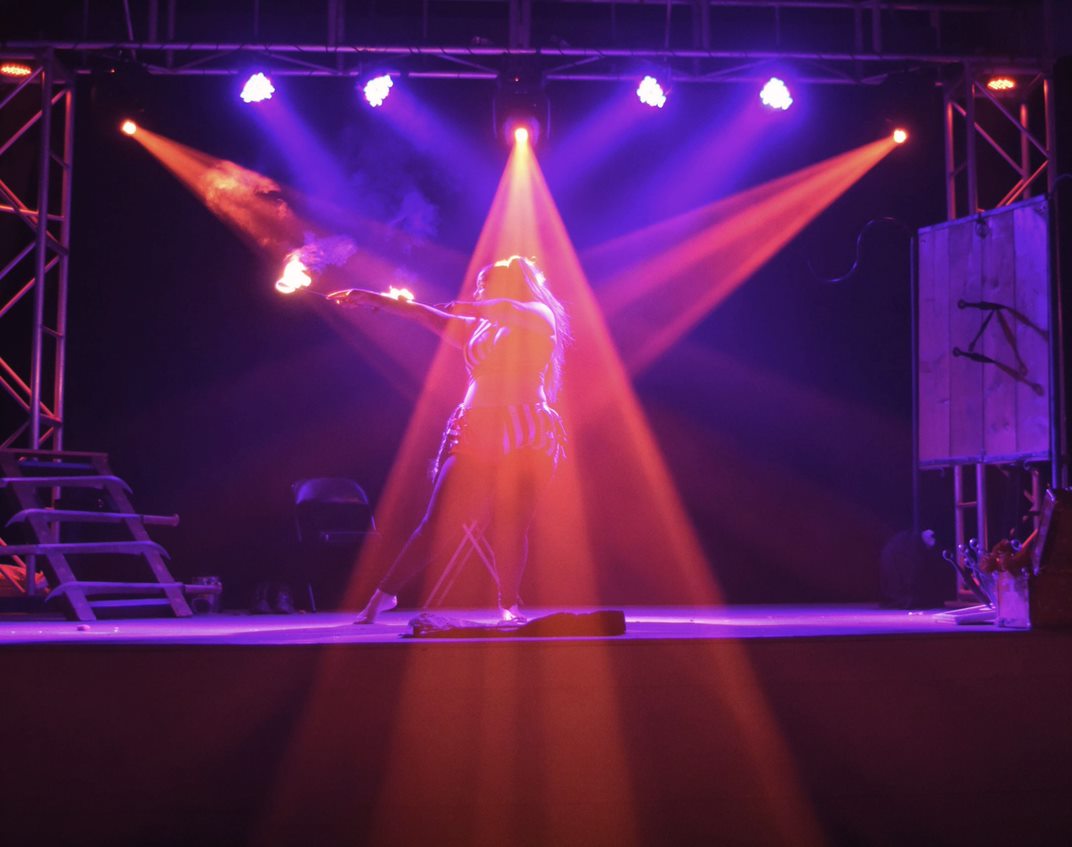 A woman dancing on stage.
