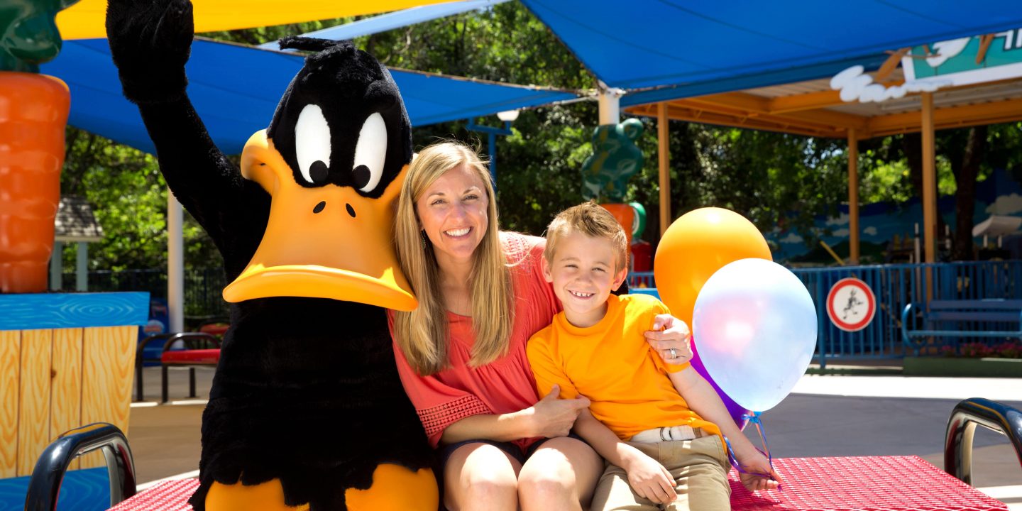 daffy duck with guests at the park