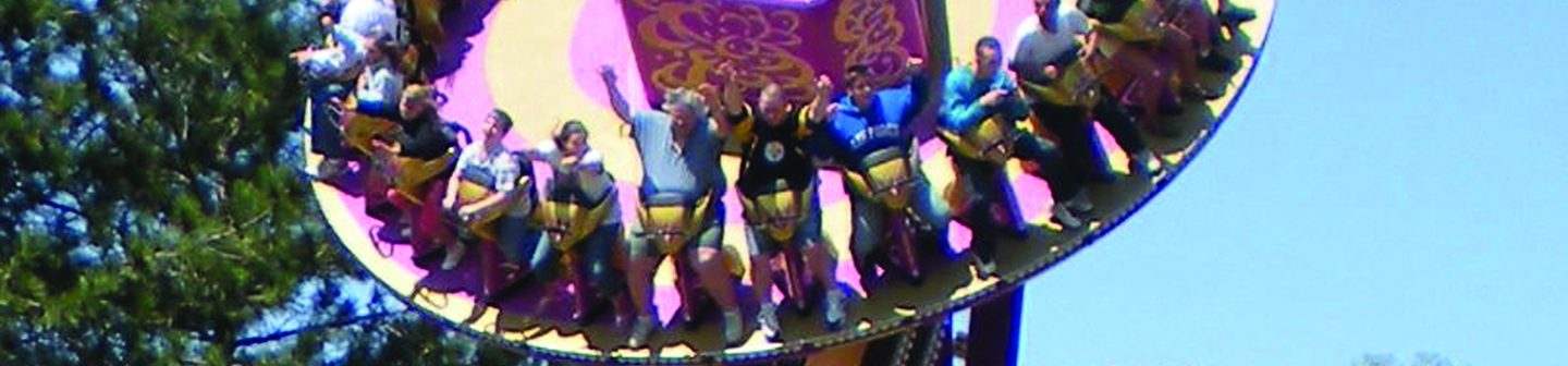 sfft_hurricaneforce5_1440x1533_0 Guests on a spinning swing ride.