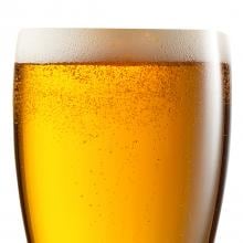 Glass of beer with bubbles