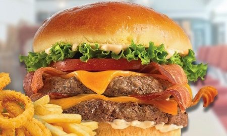 Double cheeseburger with bacon, tomato, and lettuce