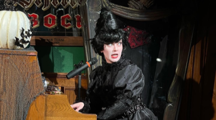 Uptight on the Upright show with female vampire playing piano